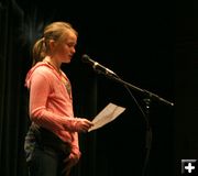 Reading a poem. Photo by Pam McCulloch, Pinedale Online.