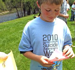 Releasing Butterflies. Photo by Olivia Vidal, Pinedale Roundup.