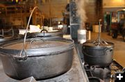 Prepare pots and coals. Photo by Dawn Ballou, Pinedale Online.