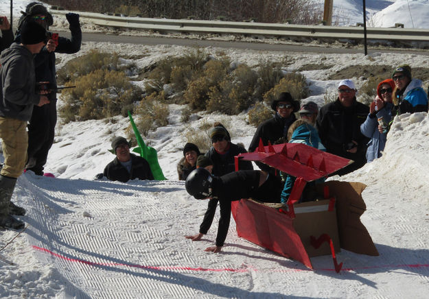 Across the finish!. Photo by Dawn Ballou, Pinedale Online.