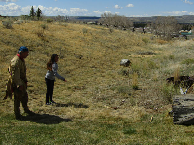 Throwing tomahawk. Photo by Dawn Ballou, Pinedale Online.