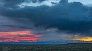 Morning Colorful Sunrise And Rain Squall. Photo by Dave Bell.